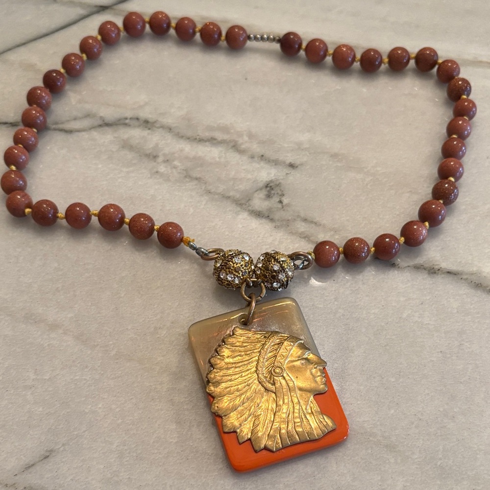 Gold and Orange Beaded Necklace with Chief Pendant